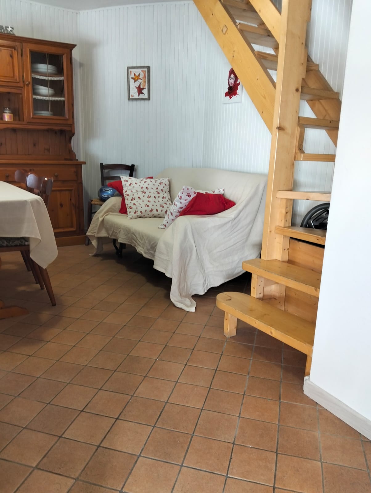 Living room — sofa and staircase